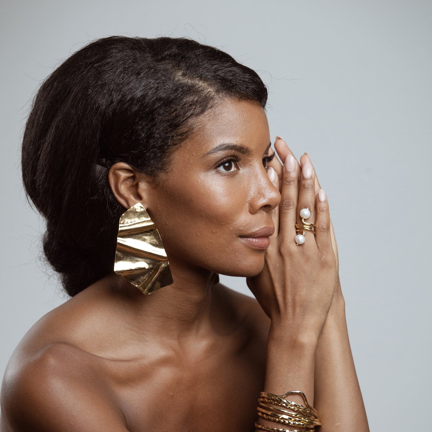 African American modelo wearing Constanza Earrings - 14k Gold Plated - Iza By Silvia D’Avila one of a kind, off the runway jewelry & wearable art - handcrafted in NYC
