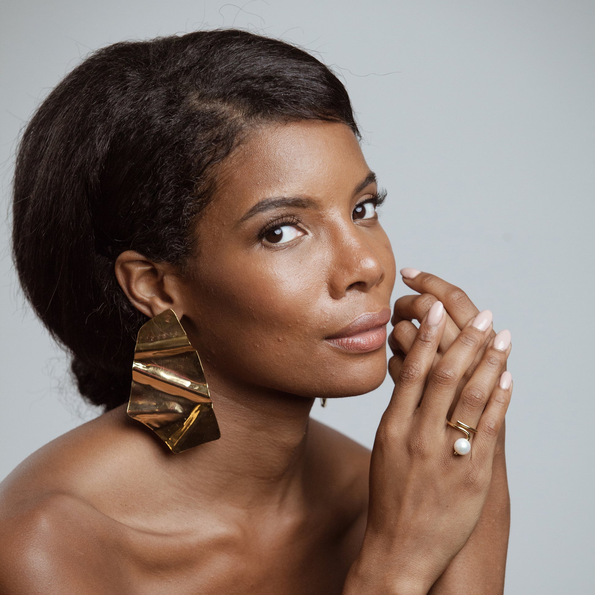 African American modelo wearing Constanza Earrings - 14k Gold Plated - Iza By Silvia D’Avila one of a kind, off the runway jewelry & wearable art - handcrafted in NYC