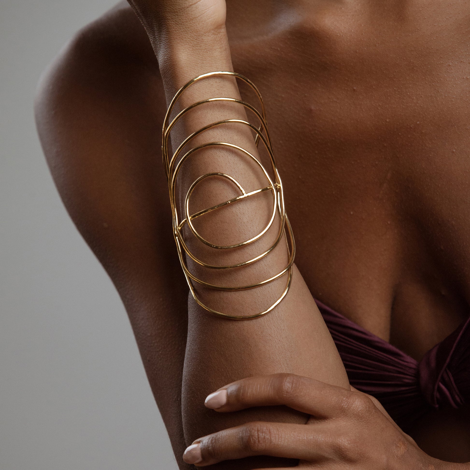 African American Model wearing Francesca Bracelet Iza by Silvia D'Avila - Original Sophistcated Statement One of a Kind Jewelry Made in NYC - 14K Pleated Gold