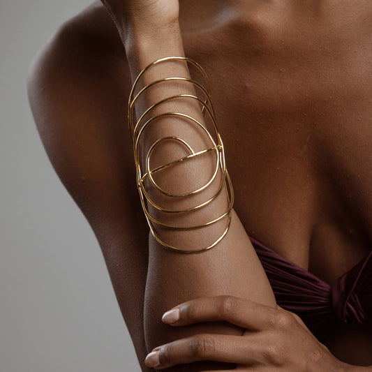 African American Model wearing Francesca Bracelet Iza by Silvia D'Avila - Original Sophistcated Statement One of a Kind Jewelry Made in NYC - 14K Pleated Gold