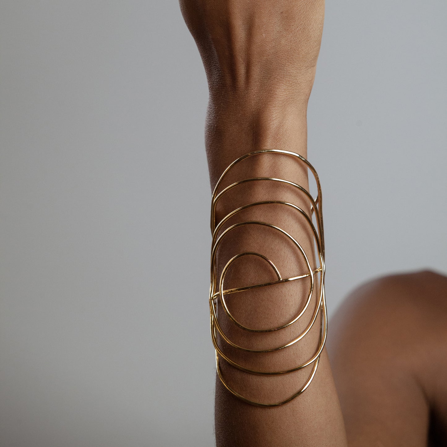 African American Model wearing Francesca Bracelet Iza by Silvia D'Avila - Original Sophistcated Statement One of a Kind Jewelry Made in NYC - 14K Pleated Gold