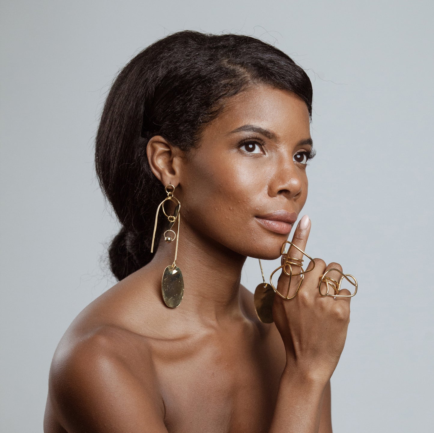 African American Model wearing Nikki Earrings - 14k Gold Plated - Iza By Silvia D’Avila one of a kind, off the runway jewelry & wearable art - handcrafted in NYC