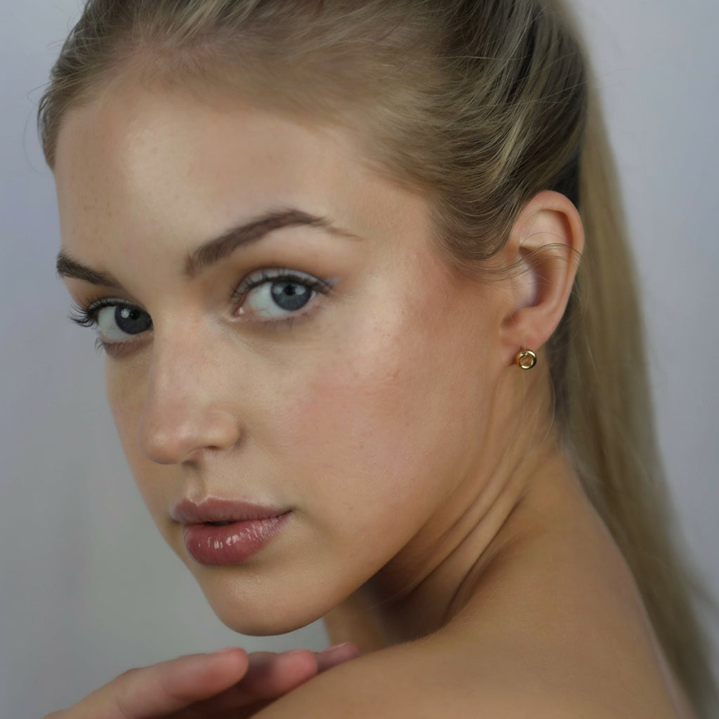 Modelwearing Gwen Earrings .25 Gold, Aura by Gabby Collection - Gabby C Thomas - Iza by Silvia D'Avila, New York